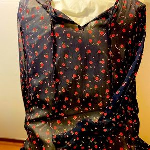 Lillarco black sheer top with open neckline